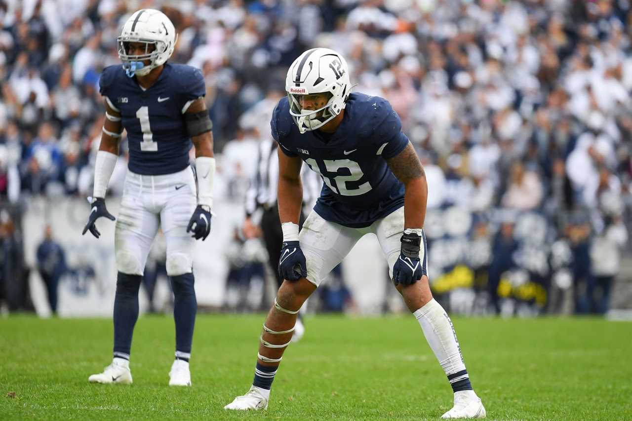 Penn State Nittany Lions linebacker Brandon Smith (12) and safety Jaquan Brisker (1) against the Illinois Fighting Illini during the second half at Beaver Stadium.