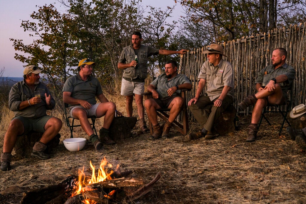 Relaxing around the fire at camp near the Matetsi River.