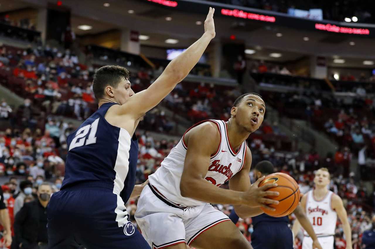 Ohio State Buckeyes forward Zed Key (23) posts with Penn State Nittany Lions forward John Harrar (21) during the second half at Value City Arena.