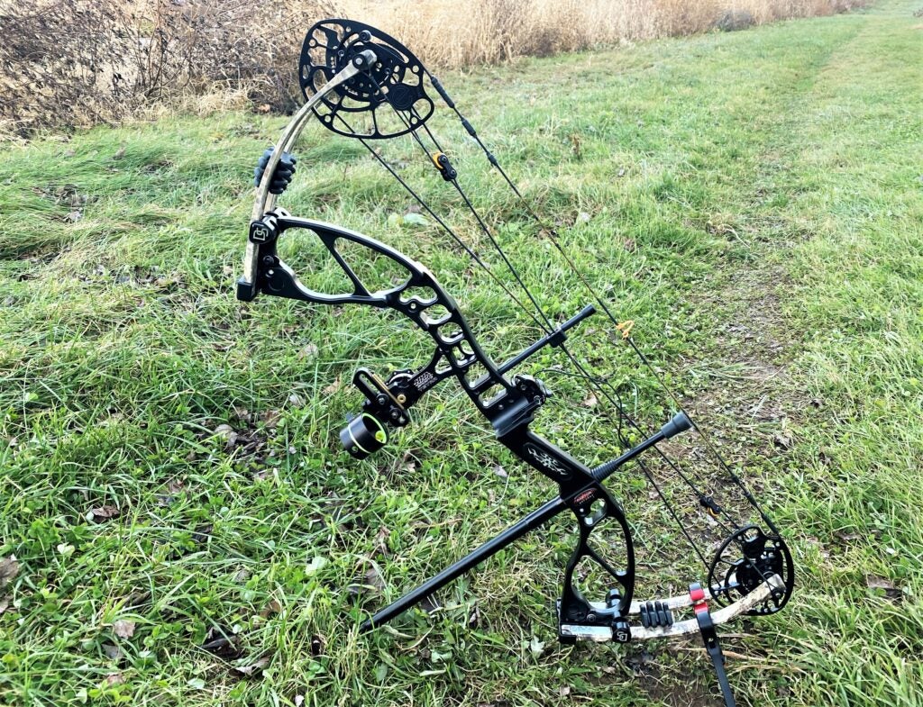 A black Darton Spectra E bow in the grass