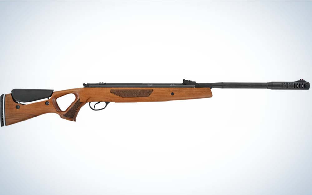 A brown wood and black airgun