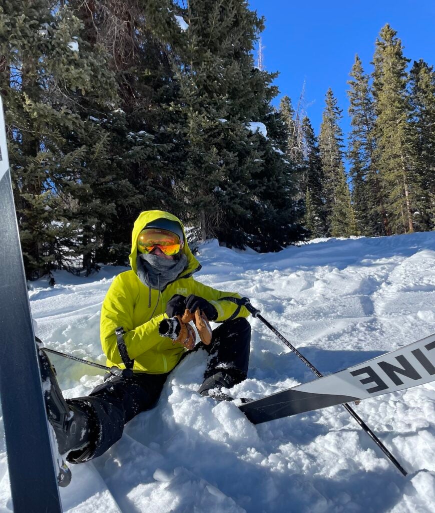 lime green Helly Hansen Verglas Infinity Shell Jacket in snow