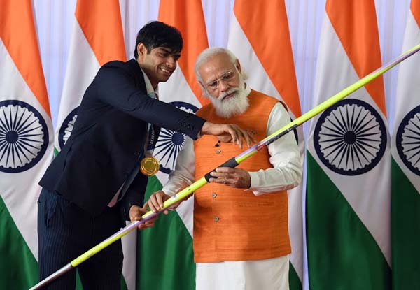 In Pics: Tokyo Olympics gold medallist Neeraj Chopra presents his signed javelin to PM Modi; PV Sindhu has ice-cream with Prime Minister