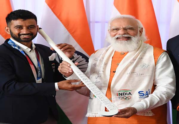 In Pics: Tokyo Olympics gold medallist Neeraj Chopra presents his signed javelin to PM Modi; PV Sindhu has ice-cream with Prime Minister