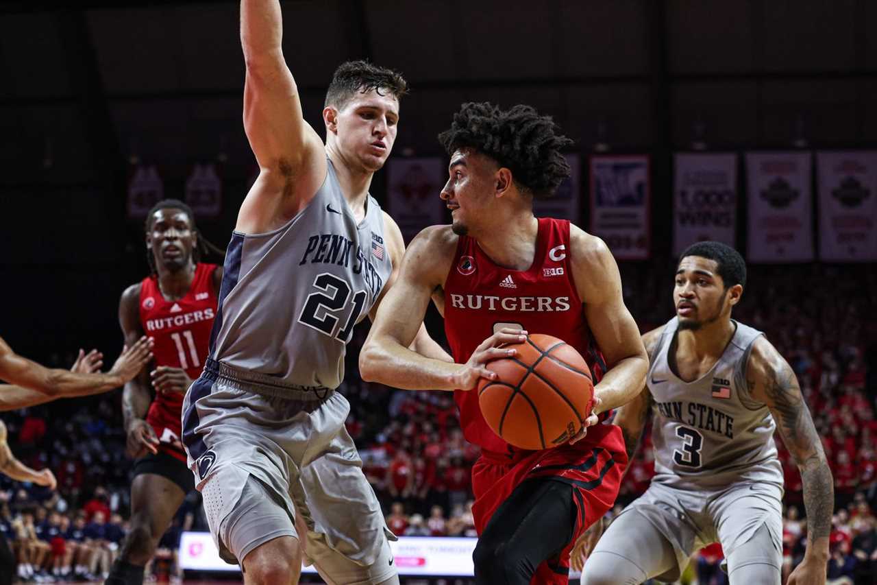 Rutgers Scarlet Knights guard Geo Baker (0) looks to pass as Penn State Nittany Lions forward John Harrar (21) defends during the second half at Jersey Mike’s Arena