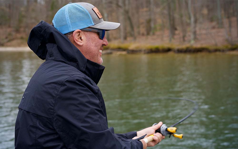 A man fishing on a river