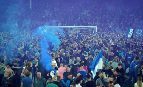 Patrick Vieira kicks Everton fan to the ground during pitch invasion at Goodison Park