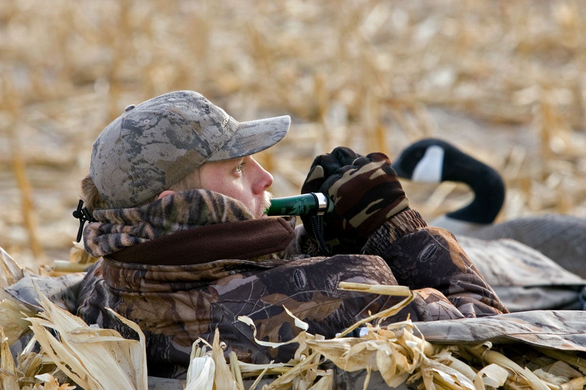 Hunter calling geese.