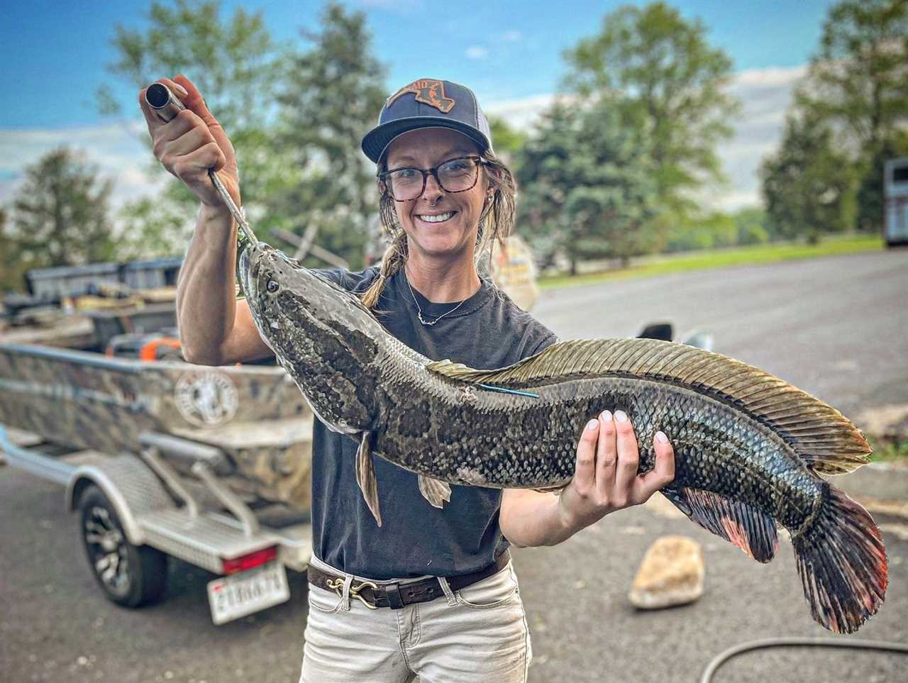 angler with maryland snakehead