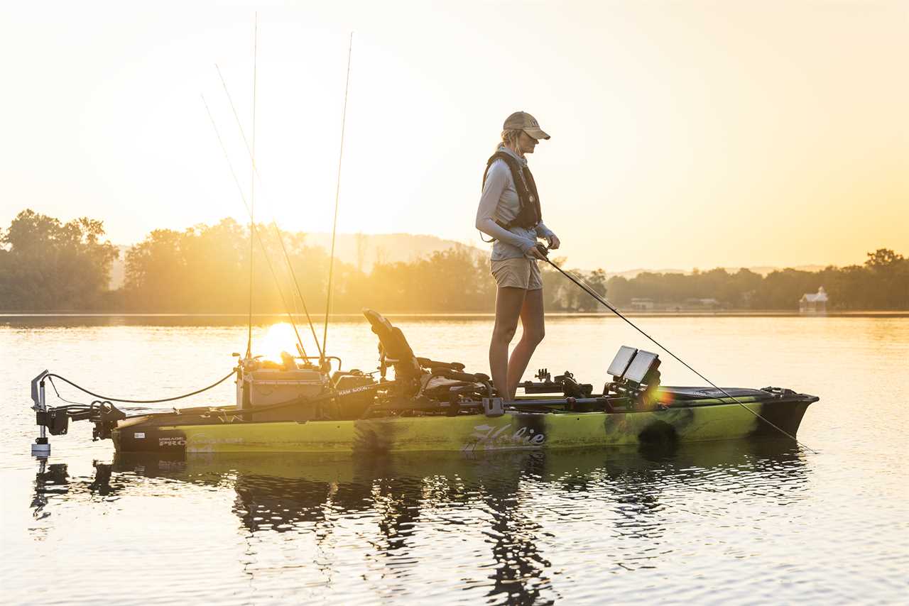 Kristine Fischer fishes from kayak