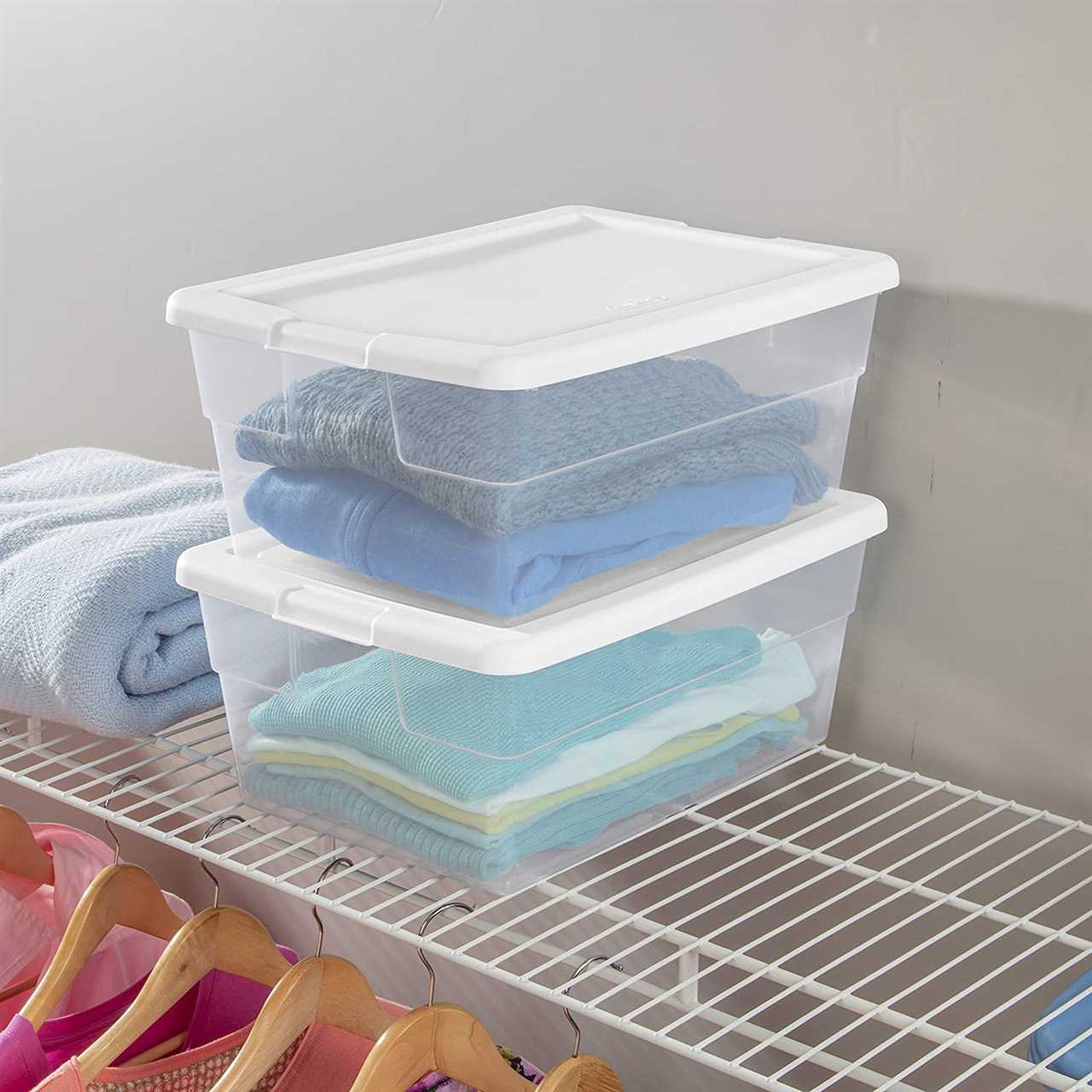 Stackable plastic storage bins with white lids