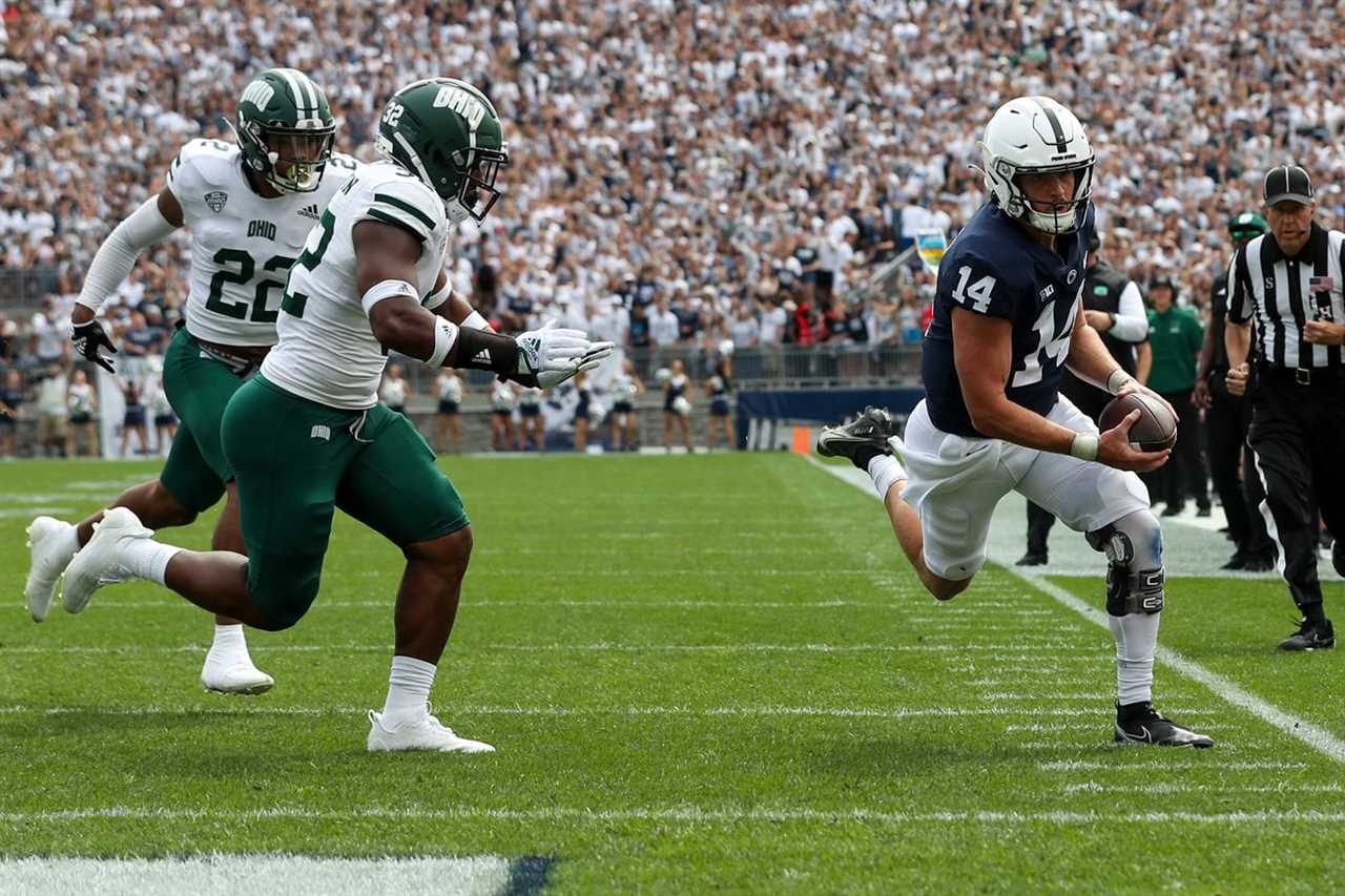 Sep 10, 2022; University Park, Pennsylvania, USA; Penn State Nittany Lions quarterback Sean Clifford (14) runs with the ball towards the end zone during the first quarter against the Ohio Bobcats at Beaver Stadium.