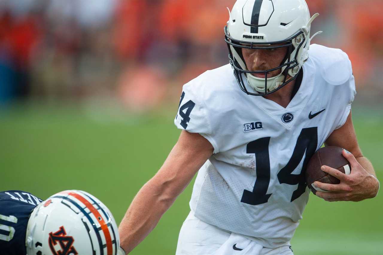 Penn State Nittany Lions quarterback Sean Clifford (14) eludes Auburn Tigers safety Zion Puckett (10) as the Auburn Tigers take on the Penn State Nittany Lions at Jordan-Hare Stadium in Auburn, Ala., on Saturday, Sept. 17, 2022.