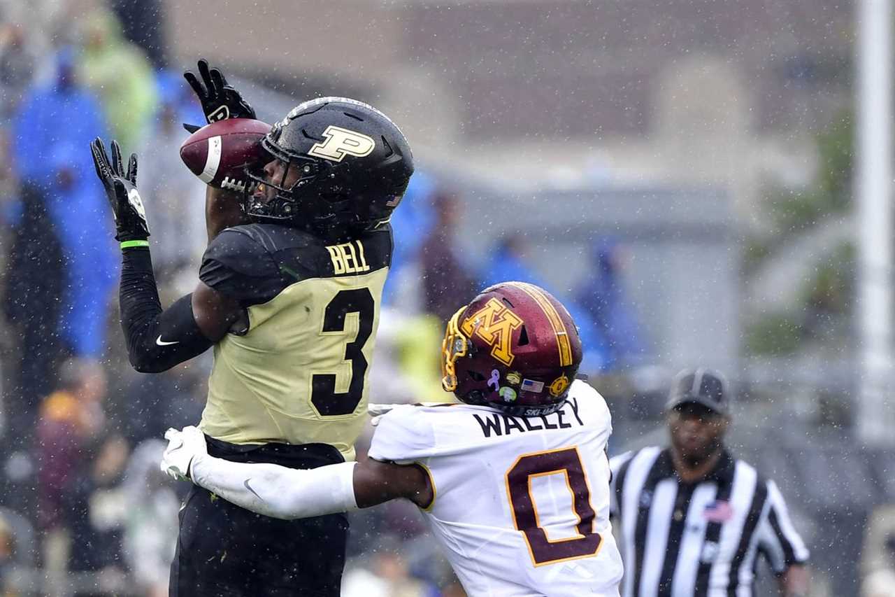 Oct 2, 2021; West Lafayette, Indiana, USA; Purdue Boilermakers wide receiver David Bell (3) catches a pass in front of Minnesota Golden Gophers defensive back Justin Walley (0) during the second half at Ross-Ade Stadium. Minnesota won 20 to 13.