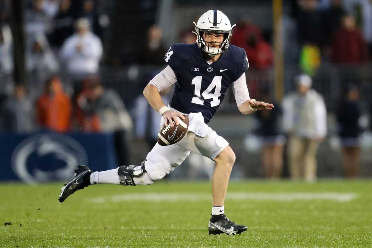 Oct 1, 2022; University Park, Pennsylvania, USA; Penn State Nittany Lions quarterback Sean Clifford (14) runs with the ball during the fourth quarter against the Northwestern Wildcats at Beaver Stadium. Penn State defeated Northwestern 17-7.