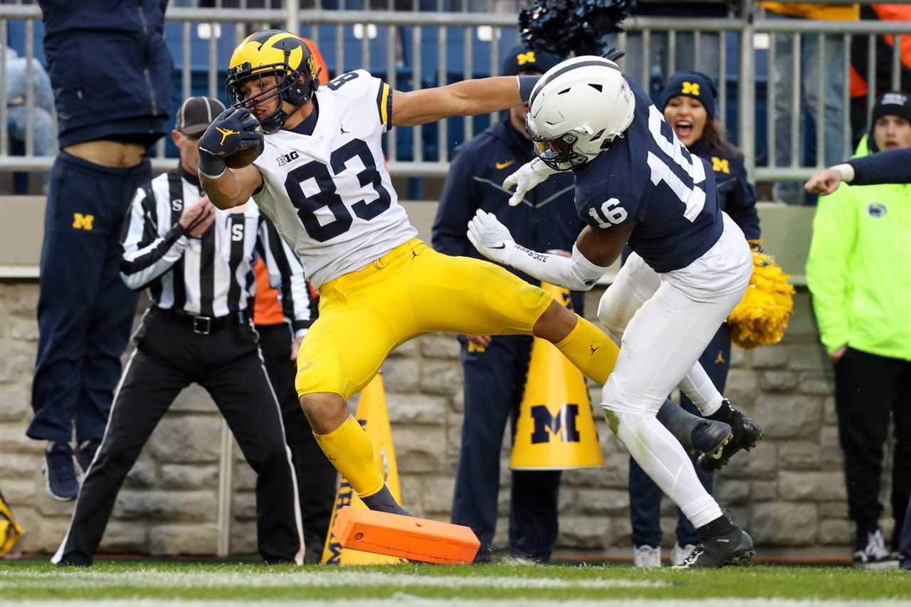 Nov 13, 2021; University Park, Pennsylvania, USA; Michigan Wolverines tight end Erick All (83) runs the ball into the end zone for a touchdown during the fourth quarter against the Penn State Nittany Lions at Beaver Stadium. Michigan defeated Penn State 21-17.