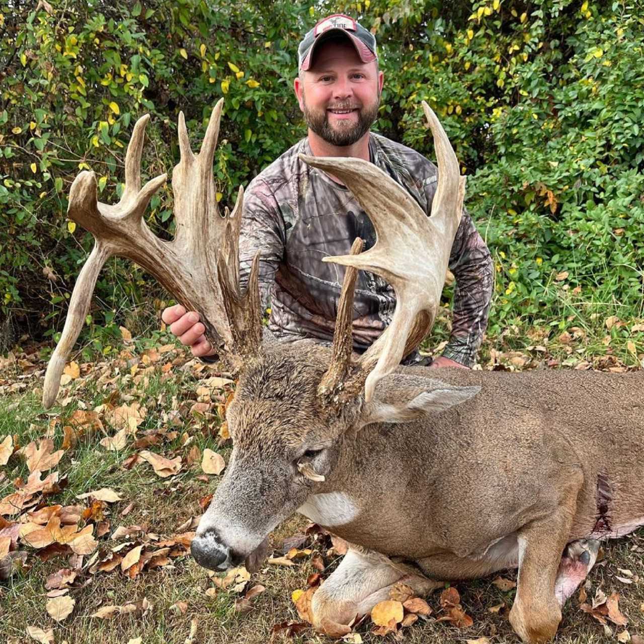Davey Stuckey with his antler-eye buck of a lifetime, whose antlers scored over 228 inches.