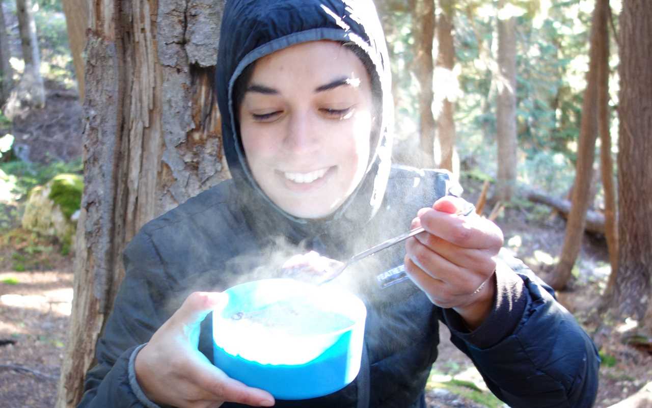 For Top Shelf, pictured here in her old Feathered Friends jacket, great gear is a way to fuel her spirit and morale on a thru-hike. 