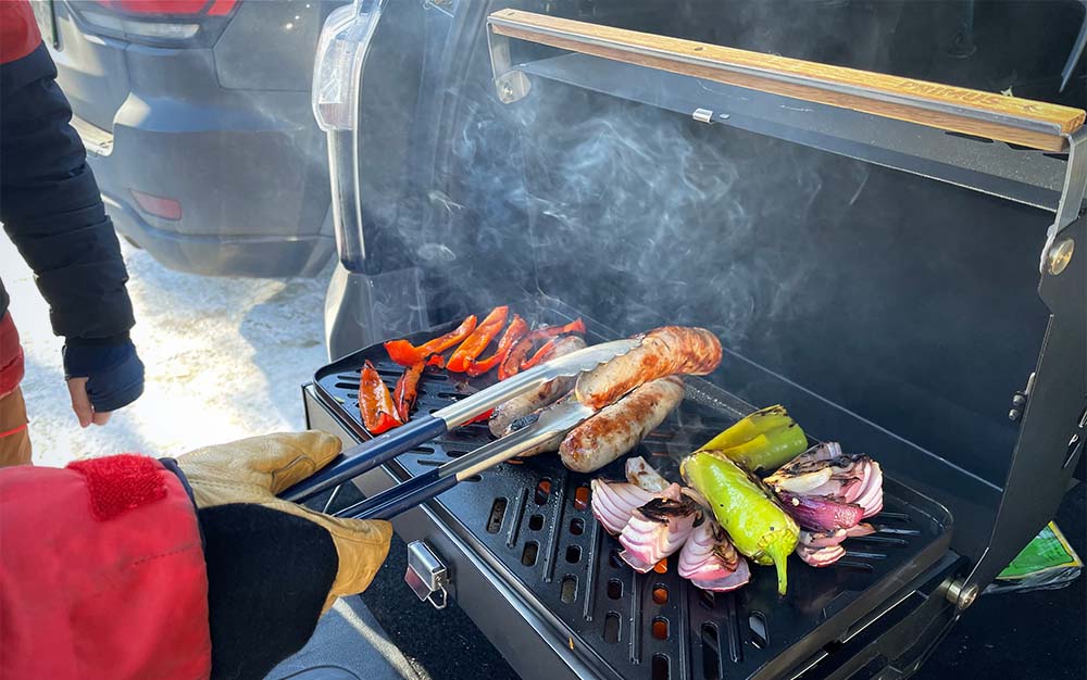 Sausages and vegetables grilling