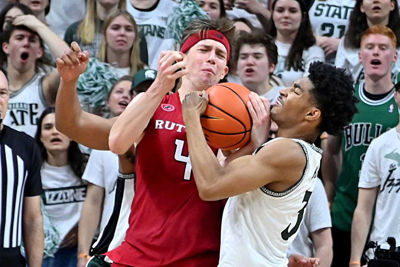 Jan 19, 2023; East Lansing, Michigan, USA; Michigan State Spartans guard Jaden Akins (3) steals the ball from Rutgers Scarlet Knights guard Paul Mulcahy (4) in the second half at Jack Breslin Student Events Center.