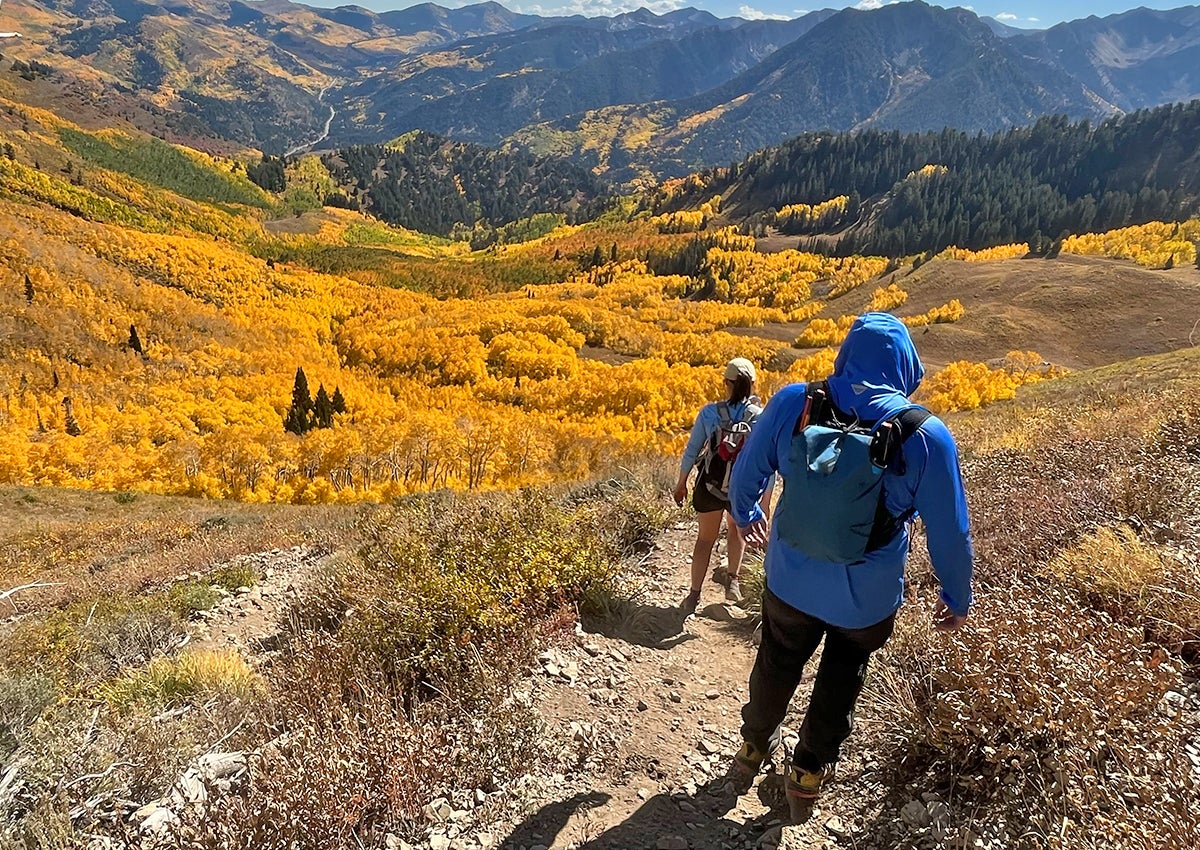 Two hikers carry the best hydration bladders.