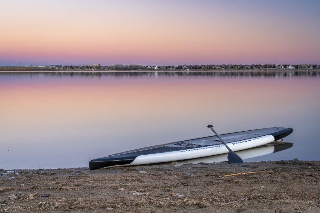 Custom paddle board on a lake