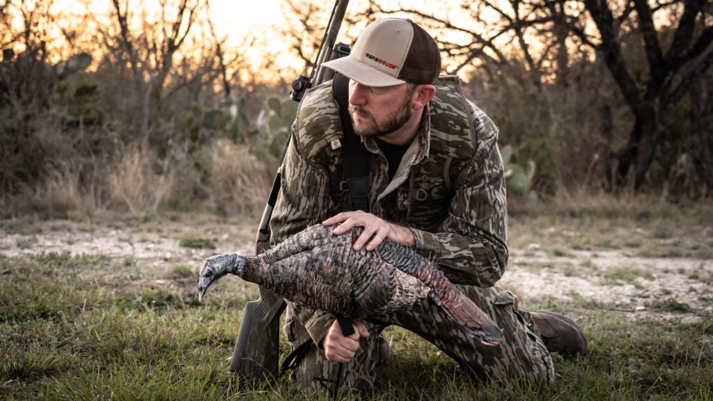 Hunter with a turkey decoy