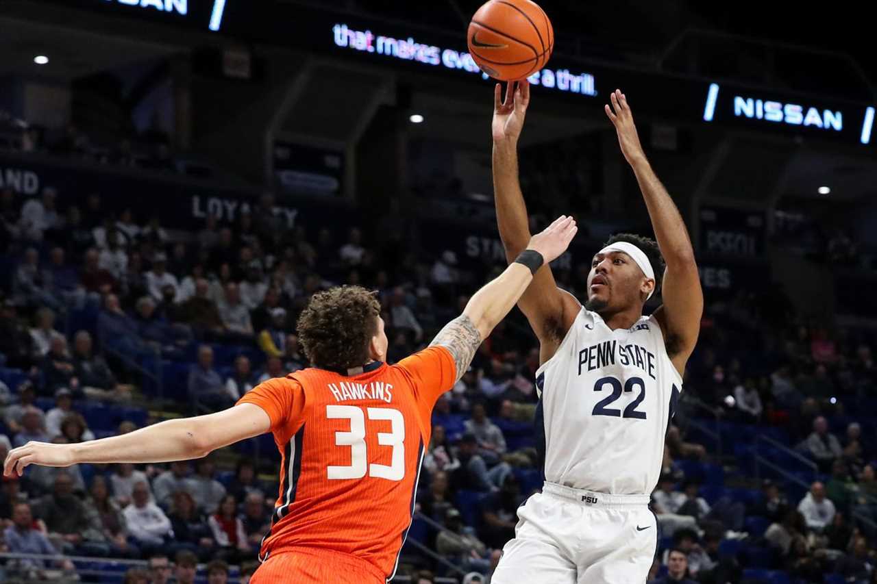 Feb 14, 2023; University Park, Pennsylvania, USA; Penn State Nittany Lions guard Jalen Pickett (22) shoots the ball as Illinois Fighting Illini forward Coleman Hawkins (33) defends during the first half at Bryce Jordan Center.