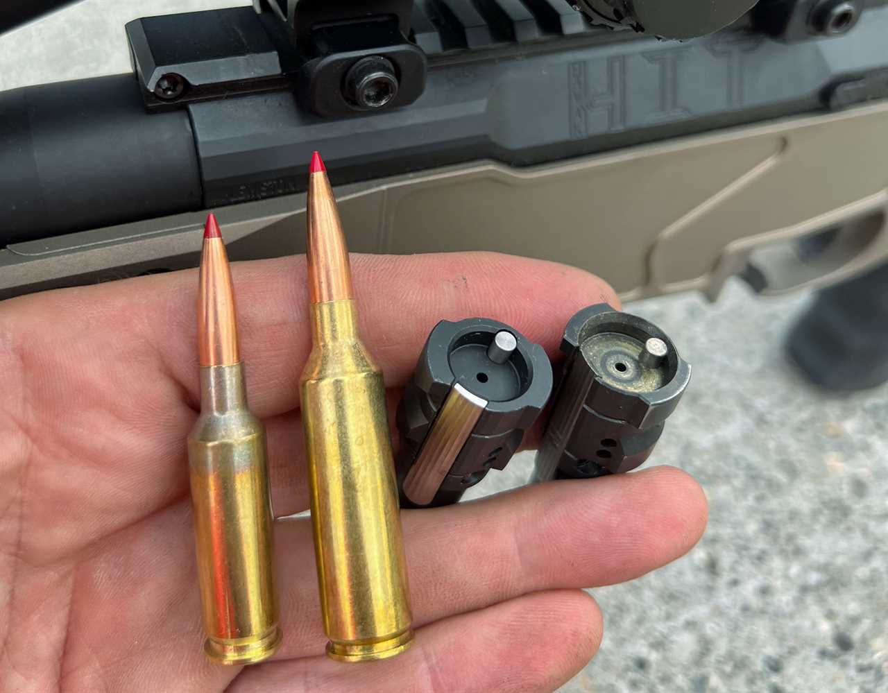 Bolt heads and cartridges in hand
