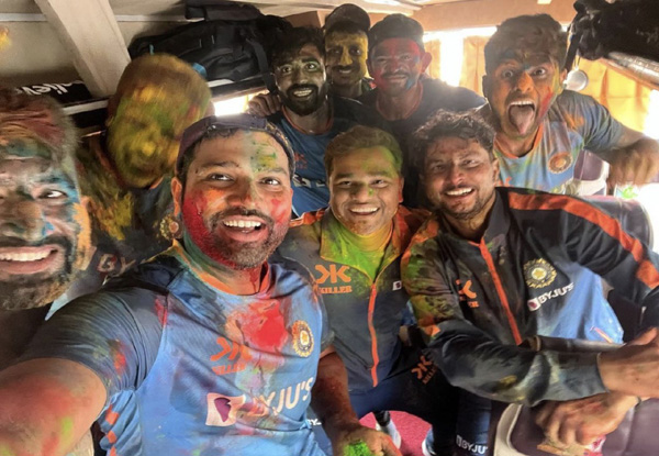 Virat Kohli croons “calm down” as Indian cricketers celebrate Holi in dressing room and Team Coach after practice in Ahmedabad | Watch Video