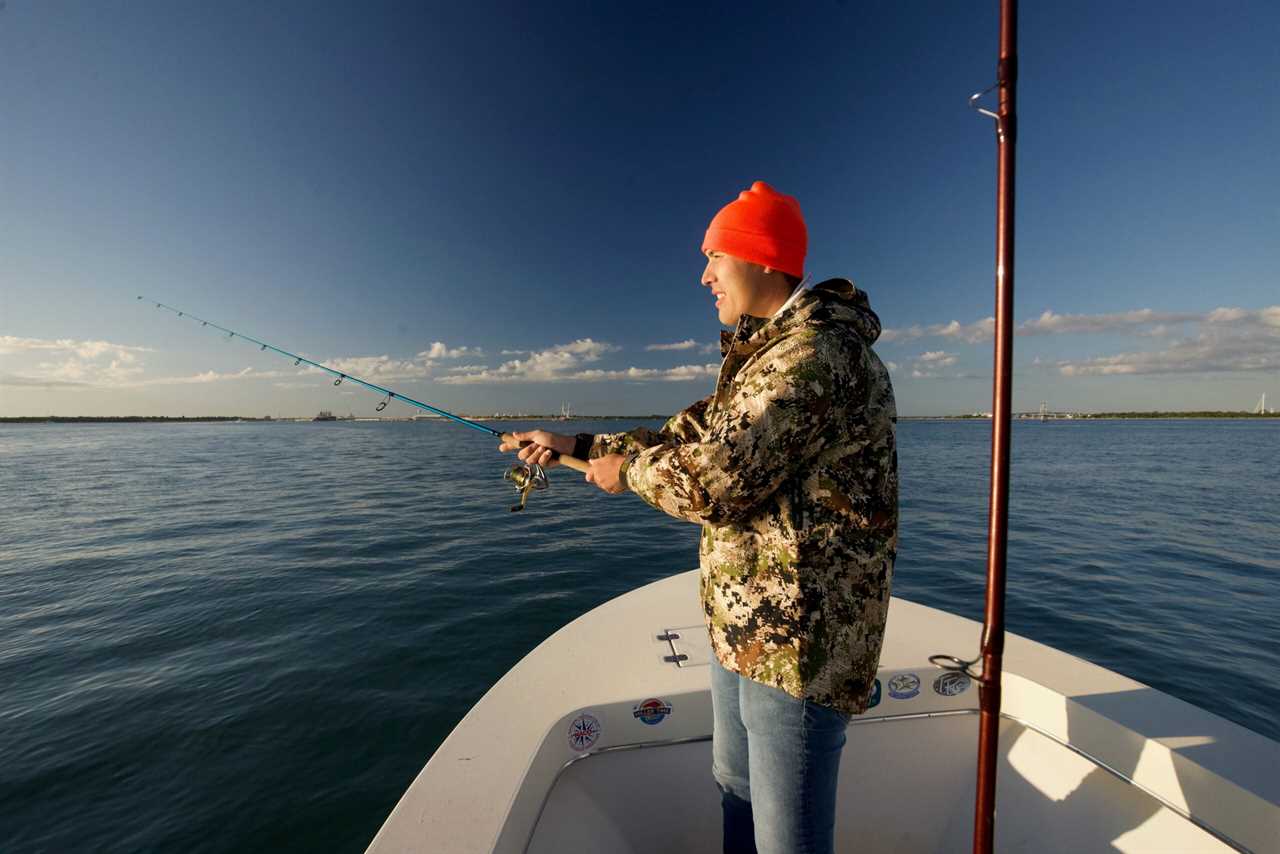 Angler fishing with the best saltwater fishing rod