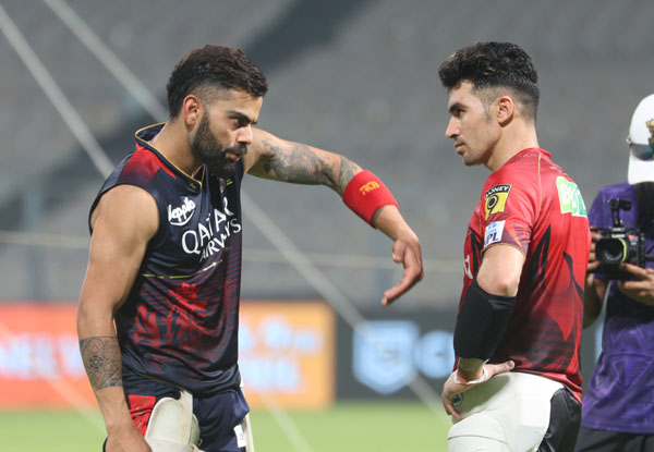 KKR’s Rahmanullah Gurbaz get batting tips from Virat Kohli ahead of RCB game at Eden Gardens | Pics