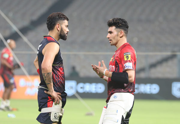 KKR’s Rahmanullah Gurbaz get batting tips from Virat Kohli ahead of RCB game at Eden Gardens | Pics