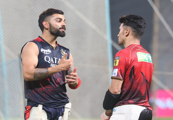 KKR’s Rahmanullah Gurbaz get batting tips from Virat Kohli ahead of RCB game at Eden Gardens | Pics