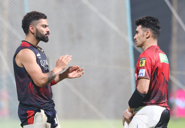 KKR’s Rahmanullah Gurbaz get batting tips from Virat Kohli ahead of RCB game at Eden Gardens | Pics