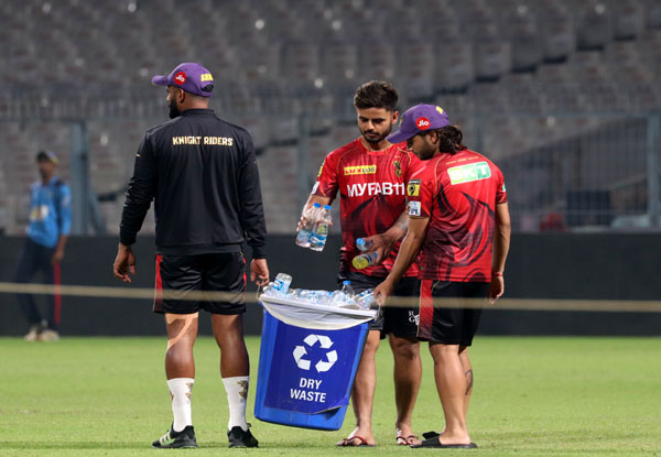 KKR captain Nitish Rana clears plastic bottles after training at Eden Gardens | IPL2023