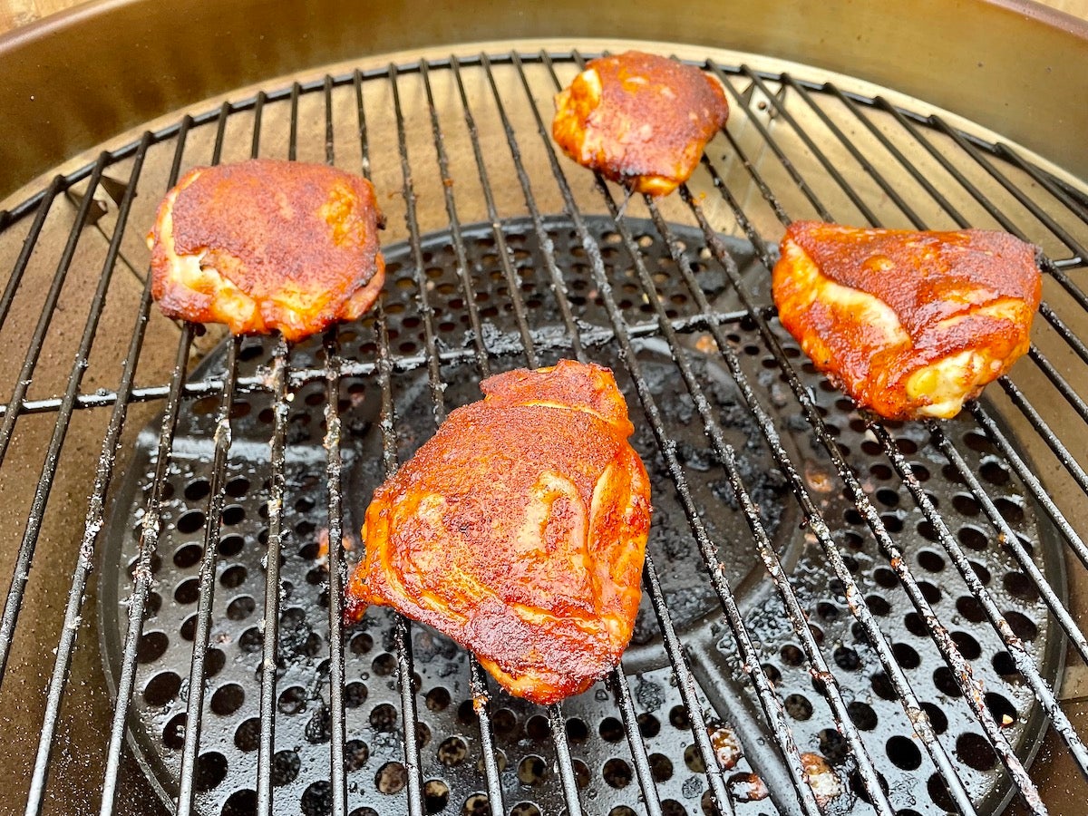 Ribeyes cooking on a pellet smoker