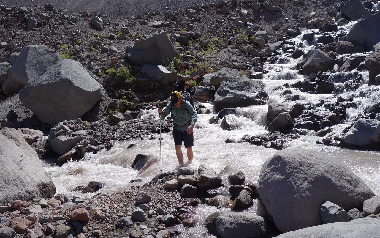 Even waterproof hiking boots won’t keep your feet dry when fording shin-high mountain streams.