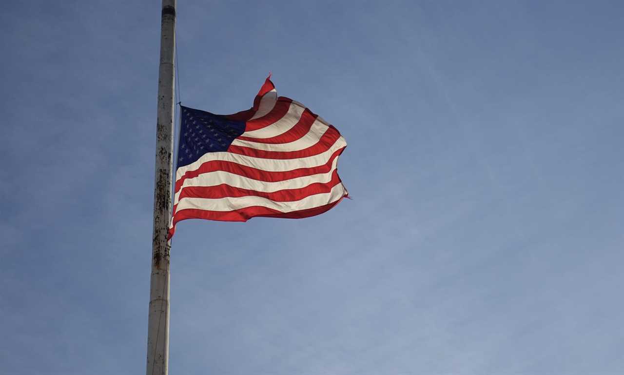 An American flag at half-mast in honor of Memorial Day.