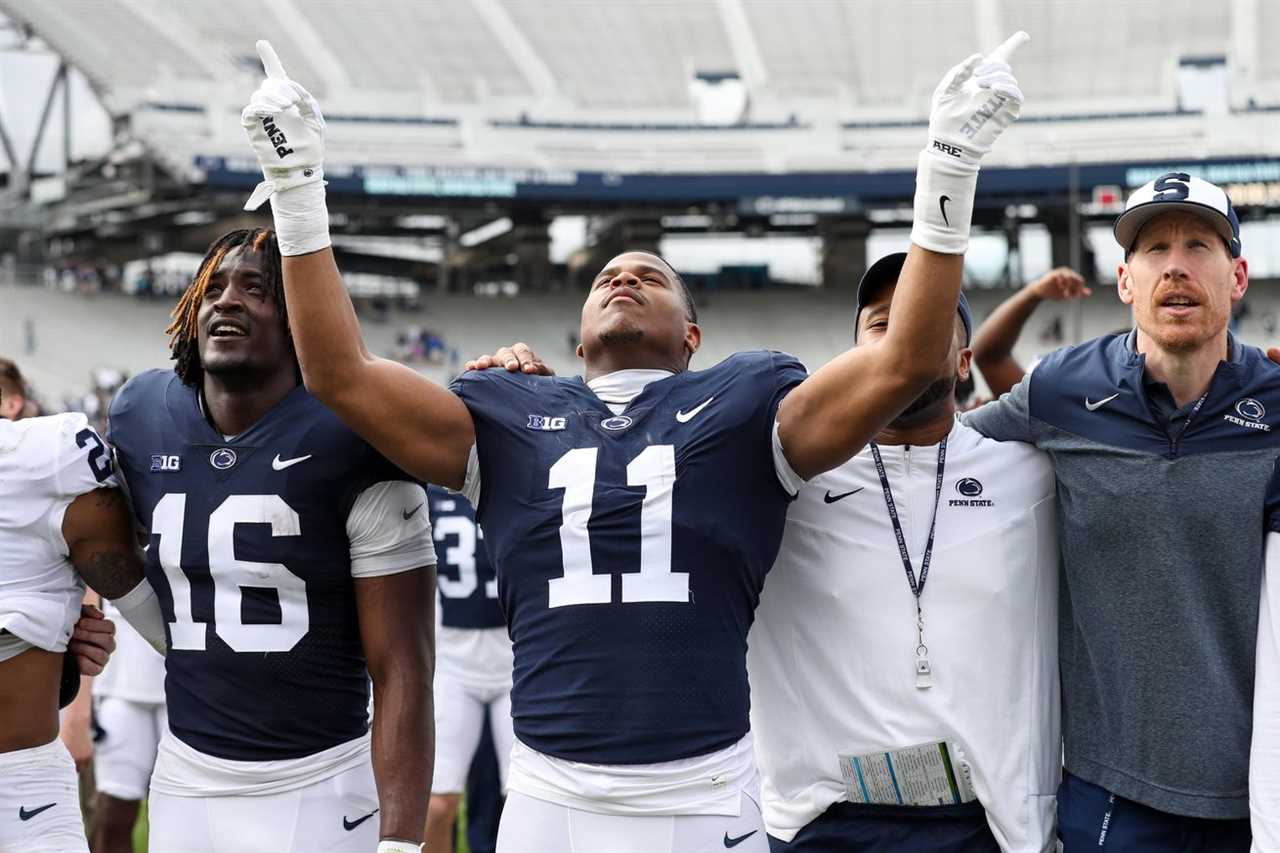 Penn State Nittany Lions linebacker Abdul Carter (11) directs his teammates during the singing of the alma mater following the competition of the Blue White spring game at Beaver Stadium.