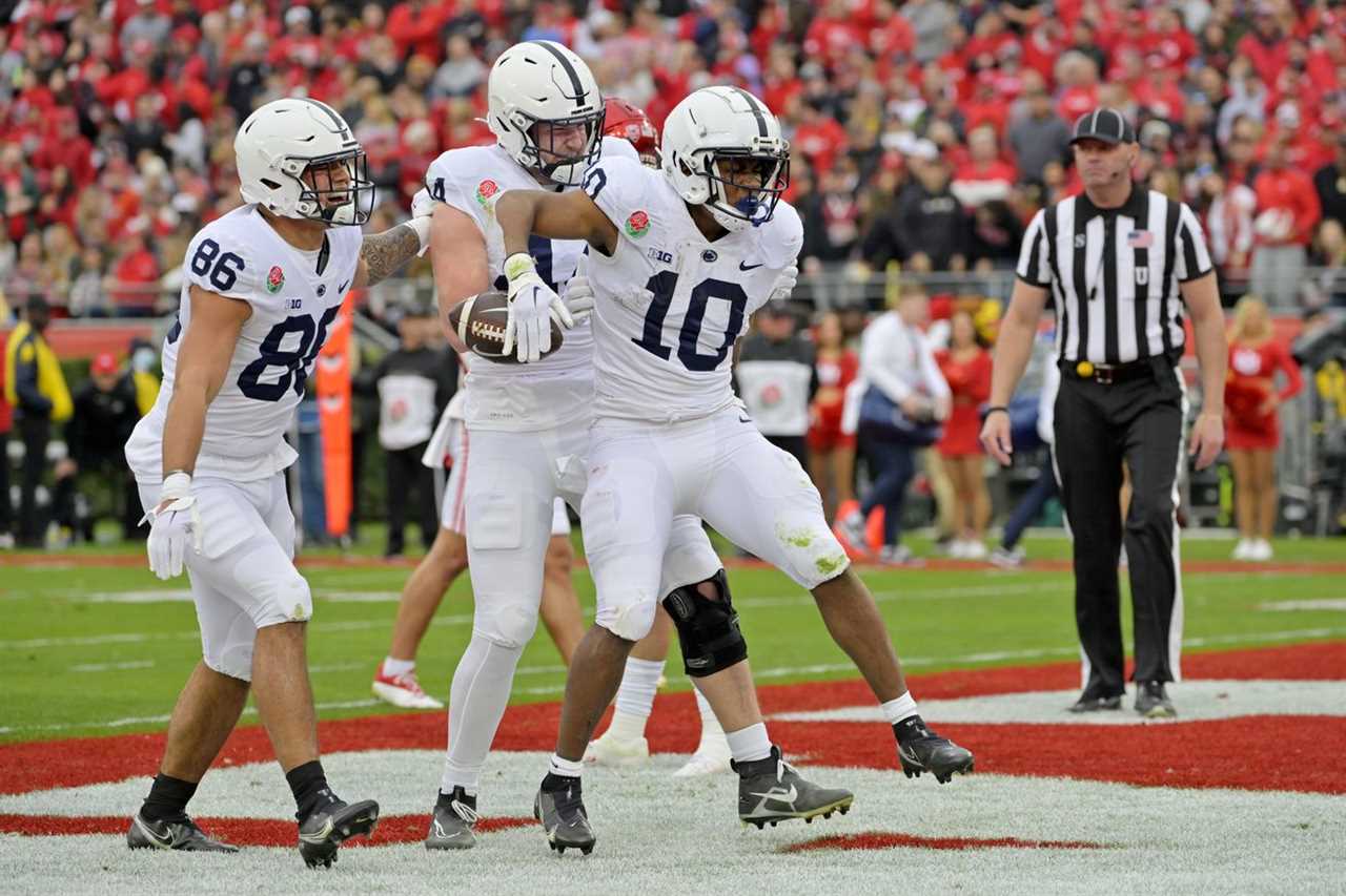 Penn State Nittany Lions running back Nicholas Singleton (10) celebrates after scoring a touchdown against the Utah Utes during the first half at Rose Bowl.