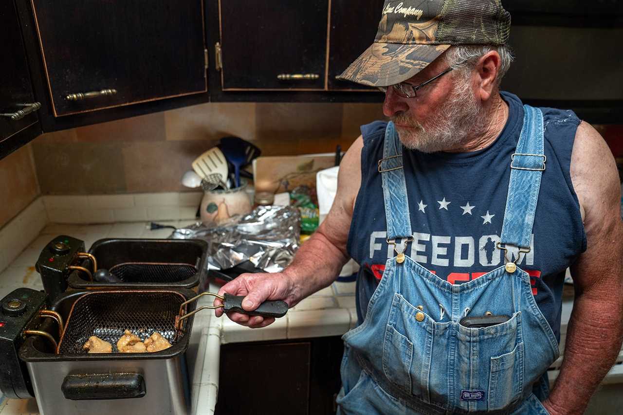 trotliner fries catfish chunks in kitchen