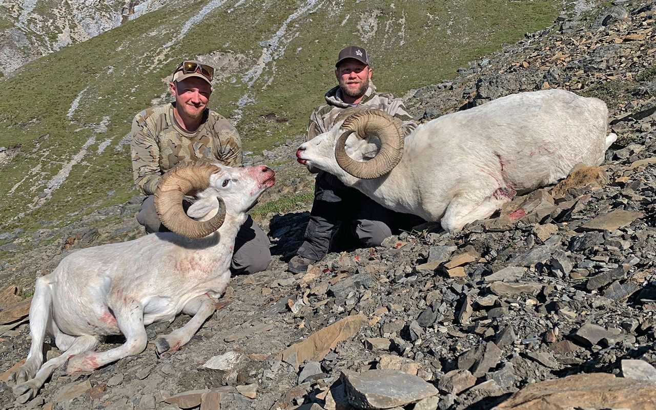 Sheep hunter wears Lowa hunting boots.