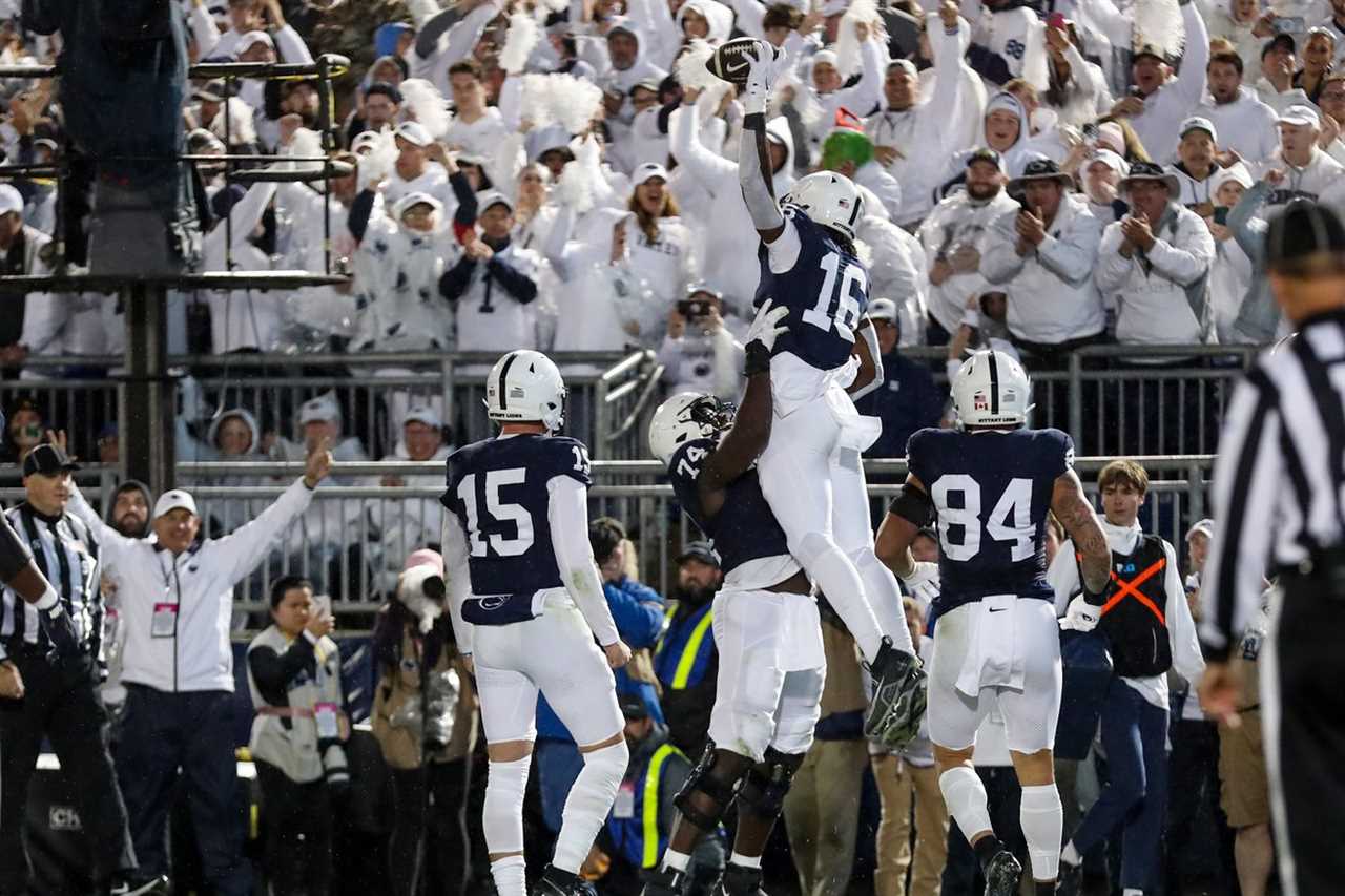 Penn State Nittany Lions tight end Khalil Dinkins (16) celebrates with teammates after scoring a touchdown during the second quarter against the Iowa Hawkeyes at Beaver Stadium.