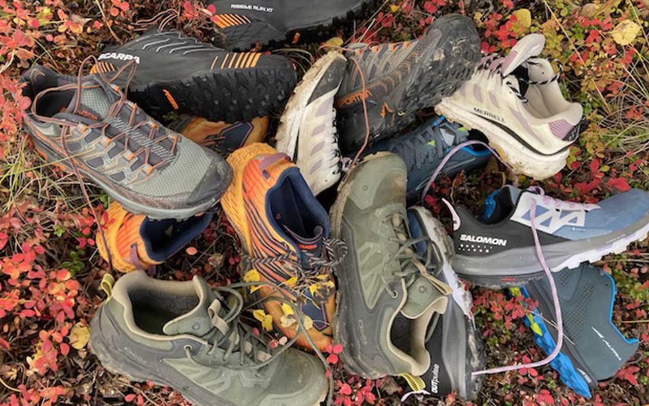 The best lihgtweight hiking shoes sit in a pile.