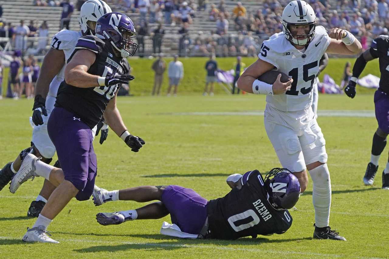 Northwestern Wildcats defensive back Coco Azema (0) defends Penn State Nittany Lions quarterback Drew Allar (15) during the second half at Ryan Field.