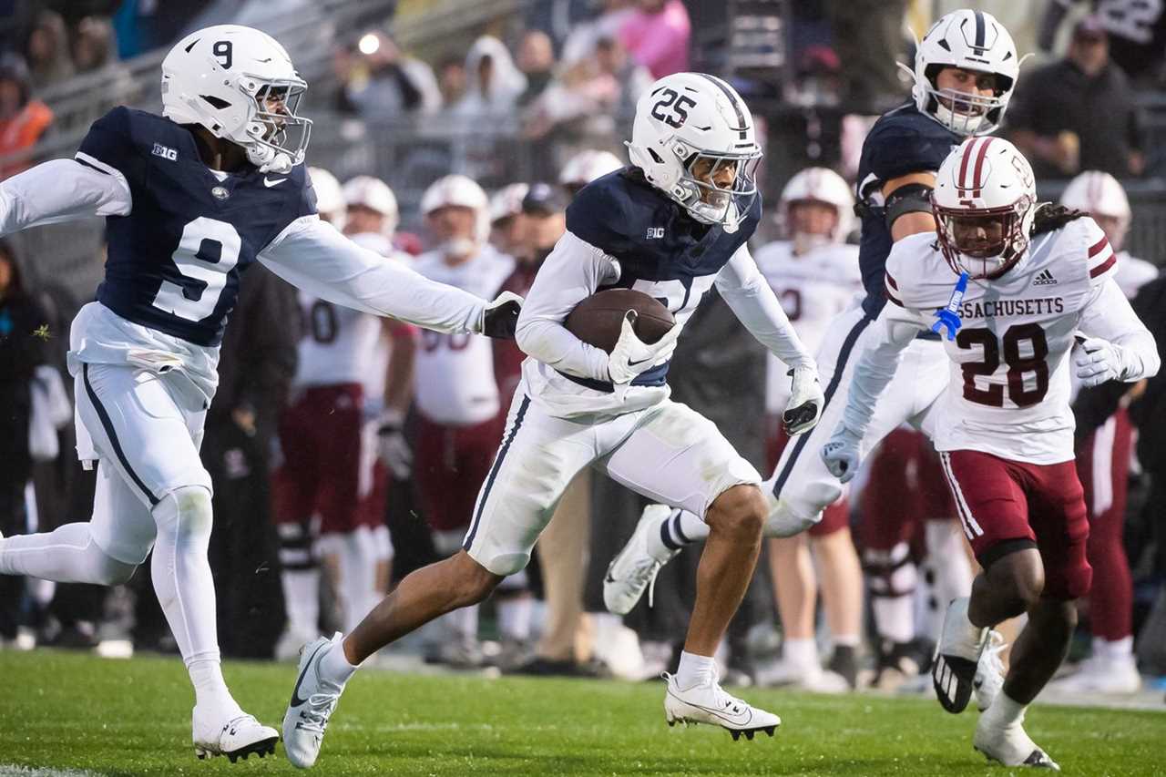 Penn State’s Daequan Hardy (25) returns a punt 68 yards to score a touchdown, his second of the game, during the second half of a NCAA football game against Massachusetts Saturday, Oct. 14, 2023, in State College, Pa.