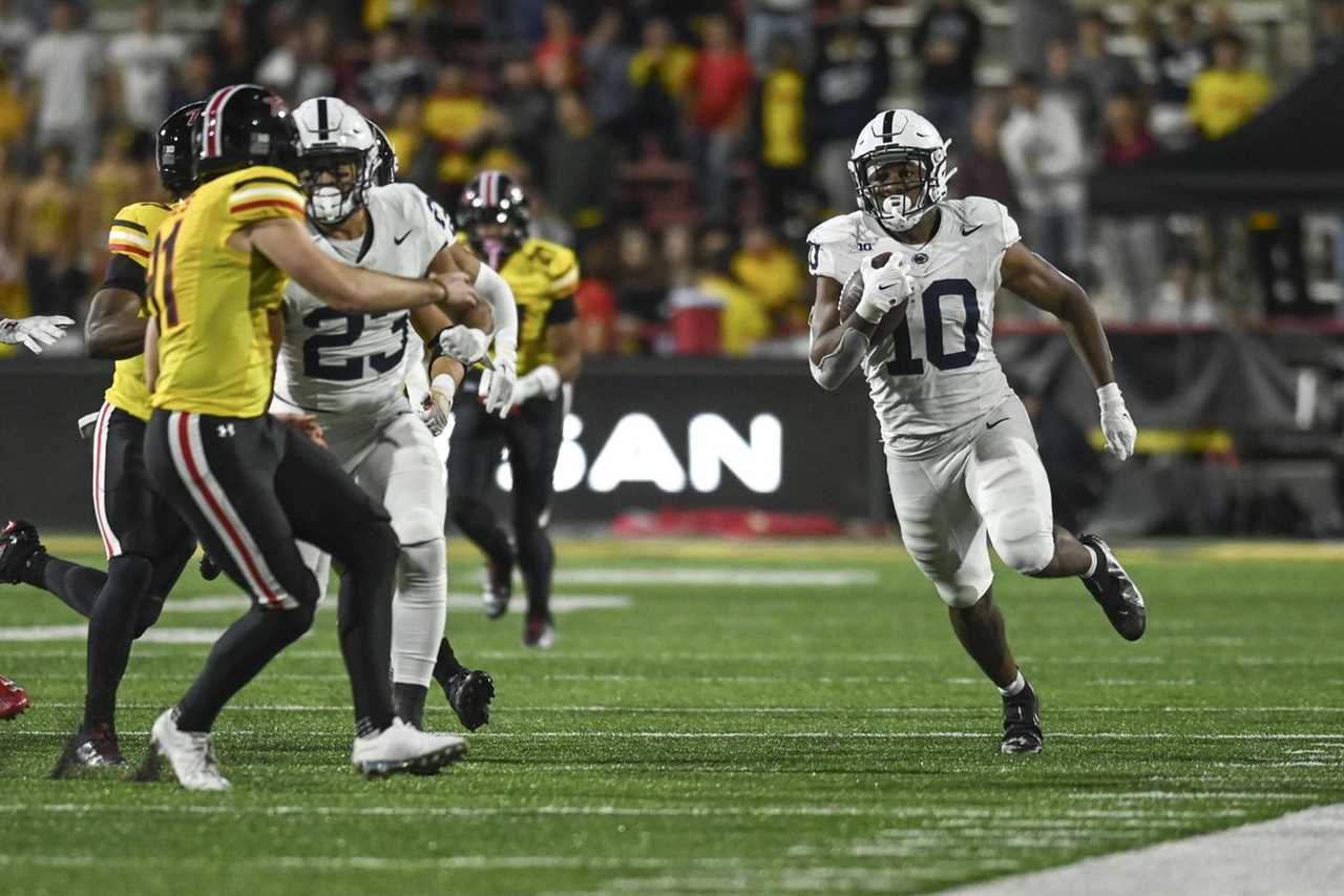 Penn State Nittany Lions running back Nicholas Singleton (10) returns a second half kickoff against the Maryland Terrapins at SECU Stadium.