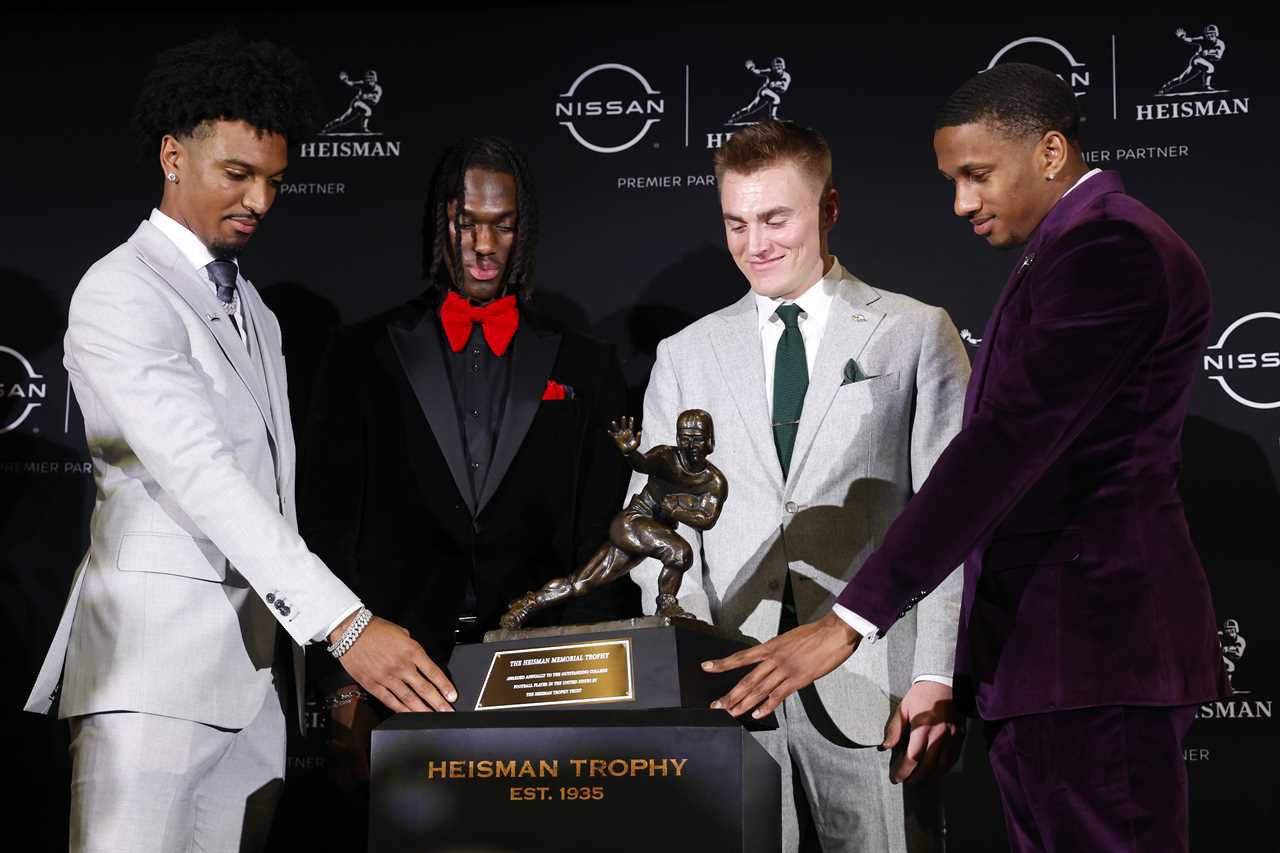 Photos of Ohio State receiver Marvin Harrison Jr. at the Heisman ceremony