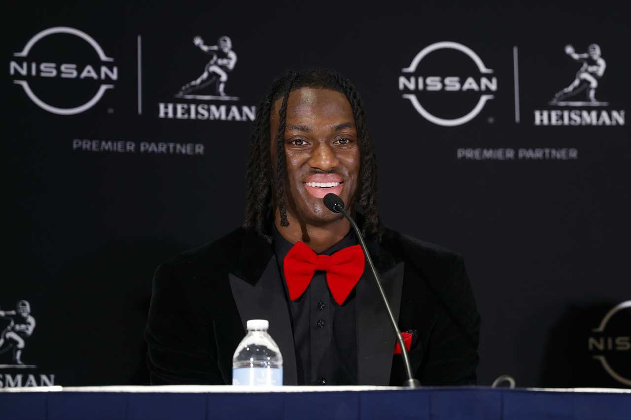 Photos of Ohio State receiver Marvin Harrison Jr. at the Heisman ceremony